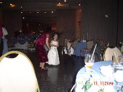 My son, trying to dance with the flower girl - He is a free spirit!