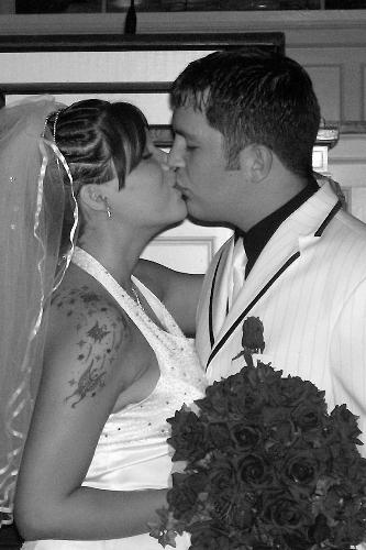 me & my hubby - This was taken on our wedding day. 6.3.06, the best day of my life! I am so happy to be married and share my life with such a wonderful man.