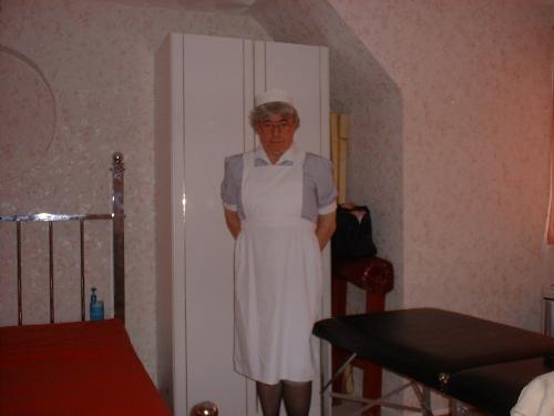 Me ready to work - I work as a male maid one day a week for a local lady. She has me clean the kitchen and bathrooms . I hoover the landing and stairs, clean the windows inside and out plus clean her car on the driveway. I don't get paid for this but I am allowed to wear proper maid uniforms as you can see which for a transvestite is excellent