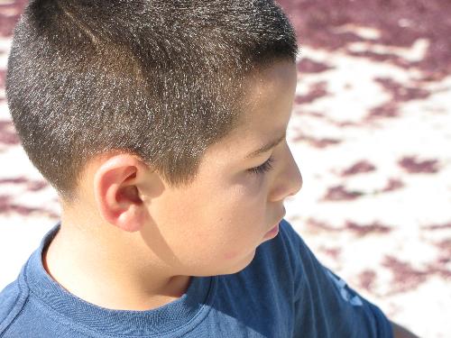 my beautiful son. profile shot at the beach - This is a picture taken while ate the beach, i just caught his profile. very cool shot.