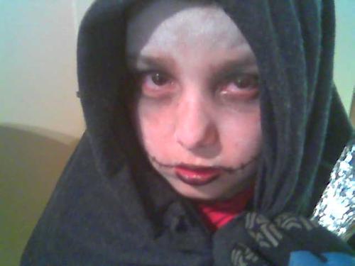 The Grim Reaper came knockin - My gorgeous son all dressed up for a halloween party, he took his role as the grim reaper very seriously..