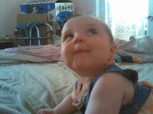 Jazzlyn Rhea - My daughter Jazzlyn at 7 months. She looks like she's coming up with a plan or something. She's my angel!