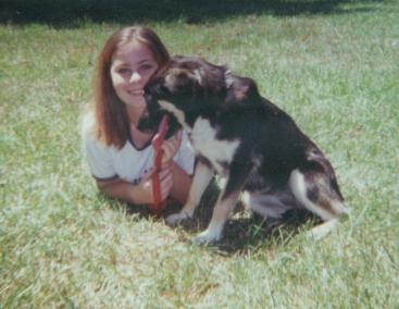 One of the girls in our yard - This is one of our girls and her dog in our backyard.