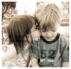 'Puppy Love' - image of a young boy and girl giving the impression of 'puppy love', expresssion used to denote children 'in love' like young puppies.