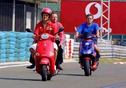 shumacer on scooter - well you must have seen micheal on car, but now look how he looks on a tiny miny scooter.


and yes a afact
mika hakkinen cant drive a car on normal roads.
he has a driver to drive him where he wants.