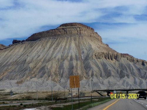 grand junction mountain - i loved the way these mountains seemed different from the ones up past morrison, colorado. in grand junction there are more plateaus...just love the contouring of this mountain, it's not as rocky as the ones i see daily out my window, it had sandy like ridges, and looked like that's where the rain flows, or snow resides, in these crevices, i dunno, but i loved them, they're just different enough, even though we were still in colorado! was a great road trip!