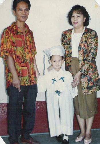 Graduation Nursery - This is my family during my son's graduation in nursery. We were so proud of him coming up as a Valedictorian. He even delivered a speech. Everytime I look at this picture, I cannot help but smile, coz God smiled at us when He gave this boy to us after 8 years of marriage.