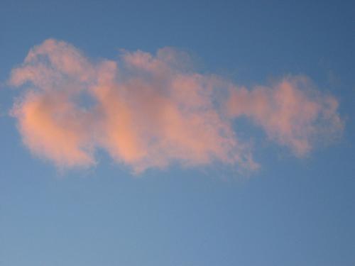 sky pictures - Mostly clear sky with a few, fluffy pink clouds, rather surreal.