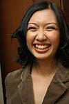 What's so funny? - I've forgotten what it was that made me laugh when I was posing for this picture, so uncharacteristic of dignified little me. Nevertheless, there it is... all thanks to that very talented photographer who must do terrific candid shots. :)