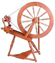 Spinning Wheel - a classic traditional styled spinning wheel makes an attractive piece of country furniture and useful decor. Spinning Wheel - a classic traditional styled spinning wheel makes an attractive piece of country furniture and useful decor.