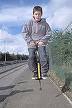 Pogo Stick - A kid on a pogo stick bouncing around in the street. Pogo Stick - A kid on a pogo stick bouncing around in the street.