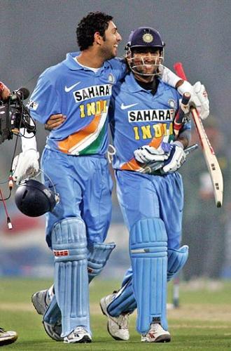 dhoni and U V celebrating - skdjfiha ihf