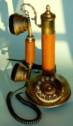 telephone - It is an old candlestick telephone.
