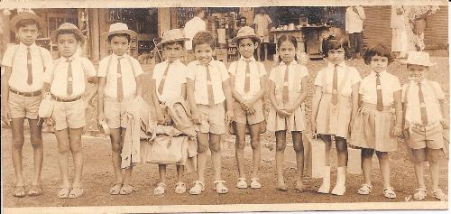 Going to school - From left : Babloo (whose Dad, Cherian Jolly took this photograph), Kumar, Gopi, Myself, Ashok, Shivan, Shanta, Rama, Mini, Appu  This photograph was taken sometime in the early 70's