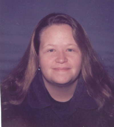 Me - This picture was taken of me at the bank of all places. Looks kinda like a mug shot! lol