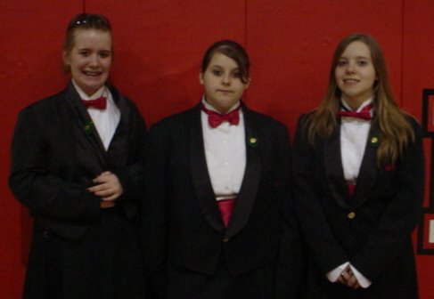 Girl Scouts 10-year pin - These three girls recently received their 10-year pins.