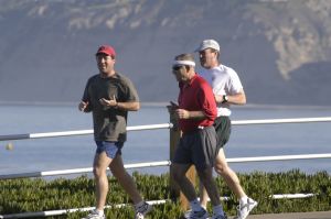 3 men jogging - 3 men are jogging including one elder