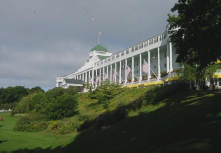 The Mackinac Grand Hotel, Mackinac Island, Michiga - Mackinac Island is located in the straits of Mackinac which is where the upper and lower peninsulas of Michigan meet. The Mackinac Grand Hotel situated on the island was the setting for two famous movies: 'This Time For Keeps' starring Jimmy Durante and Esther Williams and 'Somewhere in Time' starring Christopher Reeve and Jane Seymour.   No cars allowed on the island so to get around the favorite form of transportation for me was bicycle built for two - we went all the way around the island. Horse drawn carriages are also available.