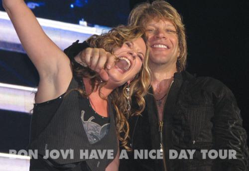 Bon Jovi and Sugarland - This is a picture of Jon with Jennifer Nettles from the country band Sugarland. This photo is from the Jan. 17,2006 concert in Atlanta, Ga at Philips Arena. I did not take this photo, I snagged it from another website.