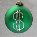 Money money money - That is very kitsch having a dollar sign Christmas tree decoration. Not in the spirit of Christmas at all. Love thy neighbour.