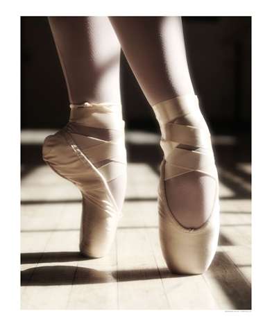 Ballet - A girl dancing ballet and doing a perfect pointe.