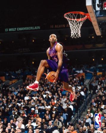 basketball - vince carter caught in mid-air dunk.