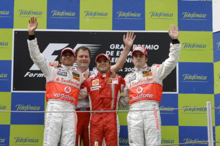 f1 - Podium at the 07 Spanish GP Lewis Hamilton, the youngest championship leader, Ferrari manager and Felipe Massa happy for the vecond victory in a row and Fernando Alonso, looks worried