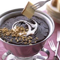 chocolate fondue - i have written this recipe long back when my friend came down my place and made it for me. i there and then jotted it down. it is very tasty.