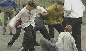 bullying and fighting - children fighting and hurting another child