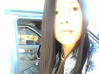 SUN kissed - I was actually waiting for my dad to finish having his car washed. I wanted to check out a part of my hair and decided to use my phone with a camera to check it out. And POOF! I found that this was a great stolen pic.