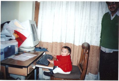 My Son working on computer - My son is two years old and is working on computer. He want to show that todays children are advanced. His name is Divyansh