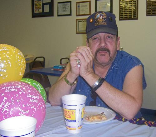 Daddy at the Party - My husband sitting at the table at our son's 5th birthday party.