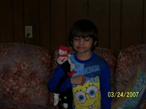 kota playing - dakota playing with his cat in the hat. He knows the book my heart (green eggs and ham). isnt he cute?