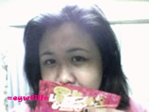 my chocoLates anD i... - im hoLding the chocolates that my sister gave me... yummy!