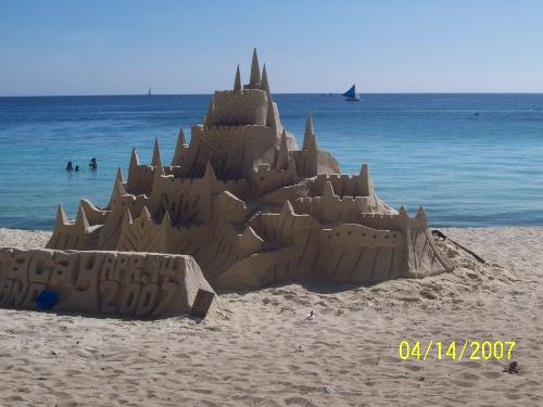 Sand castle in Boracay - There are lots of sand castles in Boracay and the one in this picture is just one of them. People repair or rebuild them everyday. Sand castle in Boracay - There are lots of sand castles in Boracay and the one in this picture is just one of them. People repair or rebuild them everyday.