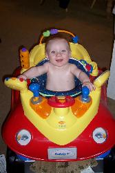 MY GRANDSON DRIVES AND I DON'T - My grandson driving his little car
