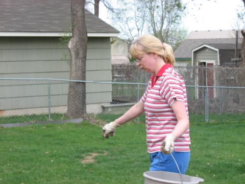 My Wife - hauling her pail of food and water for her plants