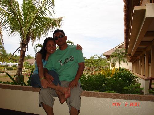 with my husband - having a great time together in a beach, enjoying the beauty of nature