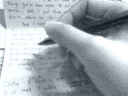 writing letters - this was taken on a nokia 6600 phone, and not on a digicam. i just edited it through adobe photoshop using the sketch effect.