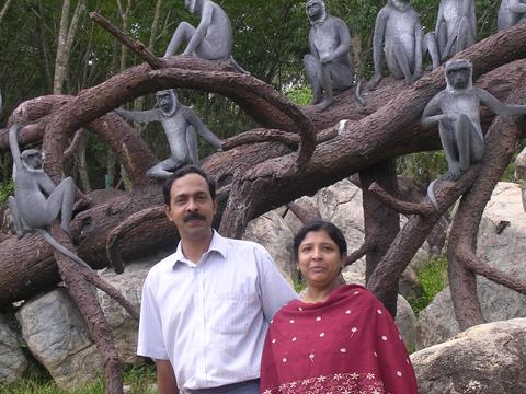 Mom and Dad - That's my mom and dad posing infront of a tree taken over by a group of monkeys!!