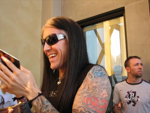 davey havok laughing - davey havok from AFI laughing at a little toy.