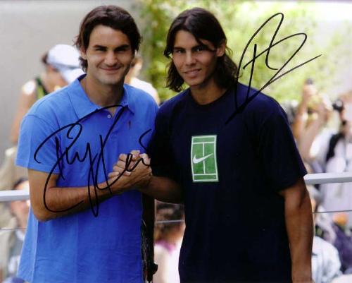 Roger Federer and Rafael Nadal - The greatest tennis players in the world! Having a friendly handshake :) They play incredible tennis! Cheers!