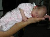 alexis - this is the photo that i entered alexis into - please vote for her!!! she was 4 wks old here and only weighed 4lbs 7 oz at the time! she fit nicely into her daddy's forearm - too bad the preemie clothes were still too big for her. voting ends 5/18/07 at midnight . .... please see my post'need your help' and vote thanks!!!!