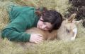 Sheilana with Goldie when he was a baby - Sheilana fell asleep with Goldie while I was doing chores.She was 13 here and he was about a week