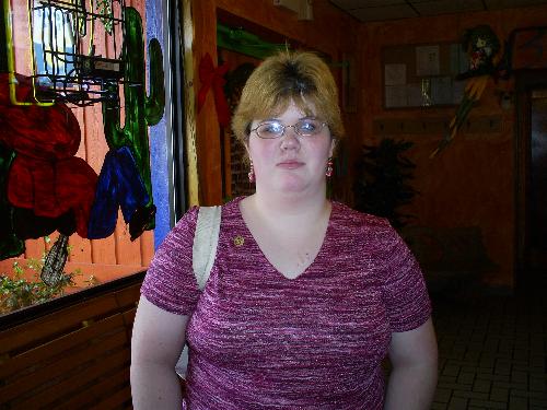 Amanda at our favorite Mexican Restaurant - Amanda was waiting outside for the rest of us when one of the waiters wanted to take this picture of her.