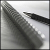 Pen & Paper - a pen on a notebook