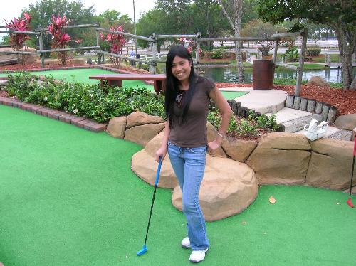 Playing miniature golf -   Playing miniature golf was fun,sometimes I hit the ball not good because that is my first time to play.After playing we take pictures as remembrance