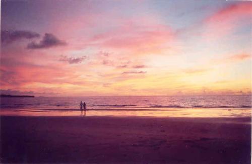 lovers by the seashore - that's my sister and her hubby over there. it was taken by a manual camera and not by a digicam. it would've been a lot better if we have digicam back then. it just frustrates me that the camera i used to take that scene didn't give any justice at all to the actual beauty of the scenery. how sad.