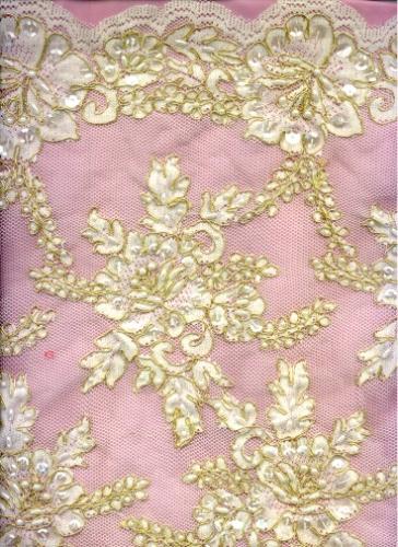 Gold lace - You can buy it and do your own wedding dress or whatever else you want.Sure will be very unique.
