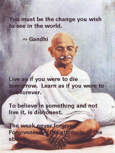 ghandi - ghandi sitting down, with his words of wisdom on the page.